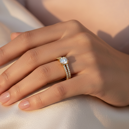 Generated image of a beautiful Indian female model wearing the yellow gold round brilliant diamond solitaire engagement ring with ornate floral four-claw cathedral setting and spectacular double row pavé diamond shank with two parallel rows of pavé diamonds on each shoulder and smooth wide plain yellow gold lower band
