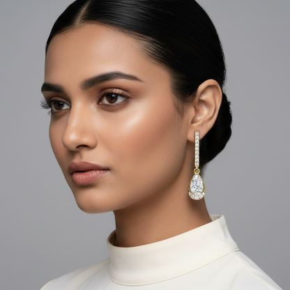 Generated image of a beautiful Indian female model wearing the yellow gold straight pavé diamond bar drop earrings with spectacular pear-shaped illusion cluster diamond pendants featuring smooth yellow gold bezel frames filled with illusion-set multi-stone diamond clusters and delicate partial pavé halo accents at the rounded base