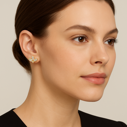 Generated image of a female model wearing the gold and diamond leaf-shaped stud earrings