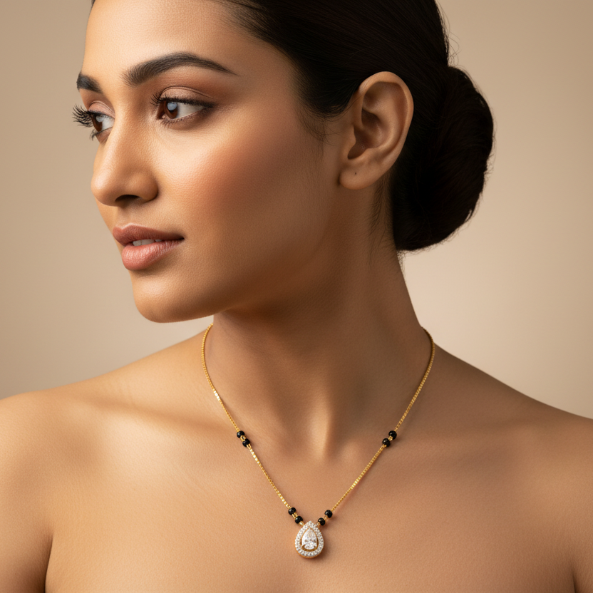 Generated image of a female model wearing the yellow gold pear-shaped diamond halo mangalsutra necklace with black beads