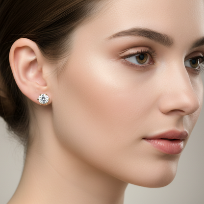 Generated image of a female model wearing the yellow gold six-prong round brilliant diamond solitaire stud earrings