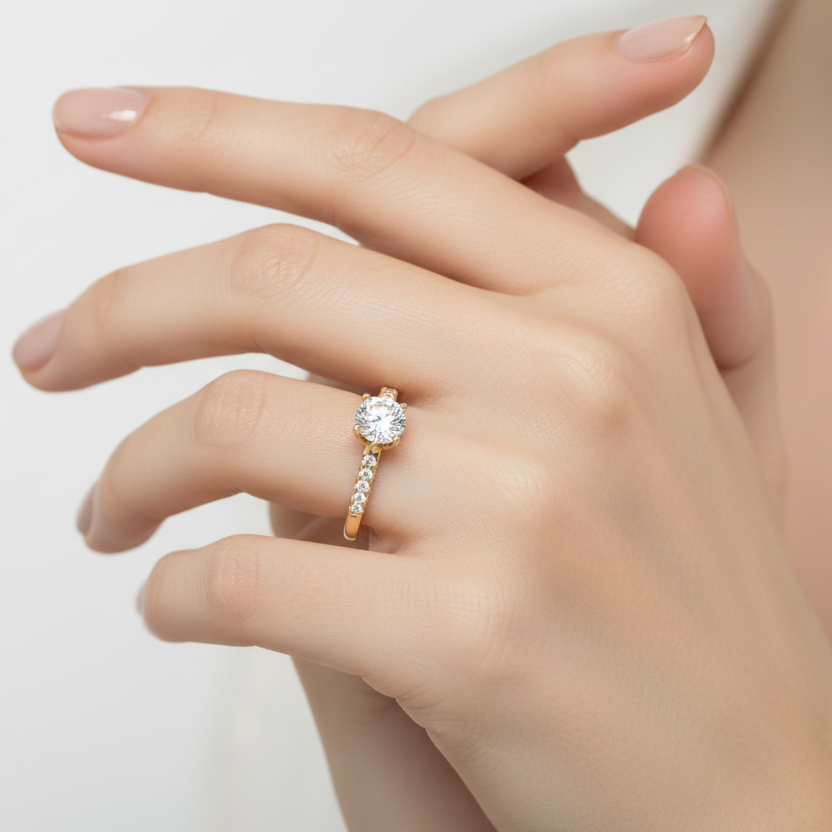 Generated image of a female model wearing the yellow gold six-prong solitaire engagement ring with graduating diamond shoulders
