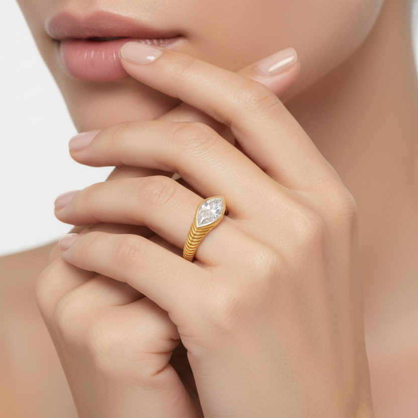 Generated image of a female model wearing the yellow gold textured ring with marquise diamond