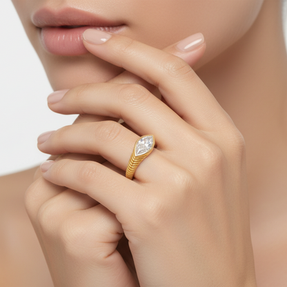 Generated image of a female model wearing the yellow gold textured ring with marquise diamond