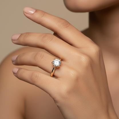 Generated image of an Indian female model wearing the classic yellow gold six-prong tulip solitaire engagement ring