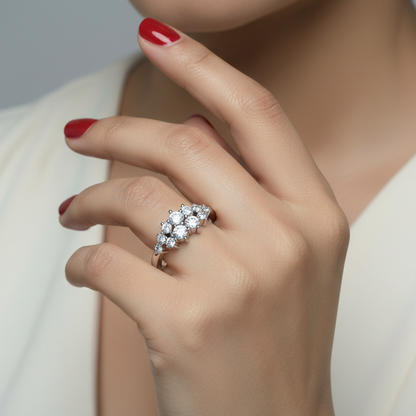 Generated image of an Indian female model wearing the white gold graduating diamond cluster crown ring with cascading double-row of round brilliant diamonds in bar-channel settings creating a magnificent tiara-like silhouette