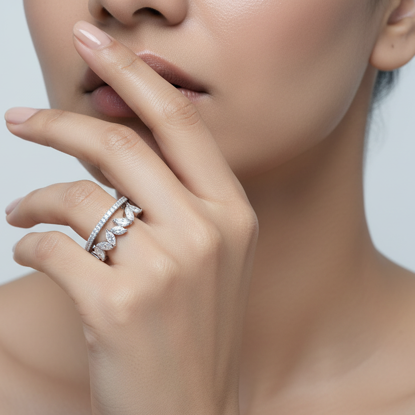 Generated image of an Indian female model wearing the white gold open double-band ring with pavé diamond upper rail and cascading mixed-cut diamond fringe lower rail