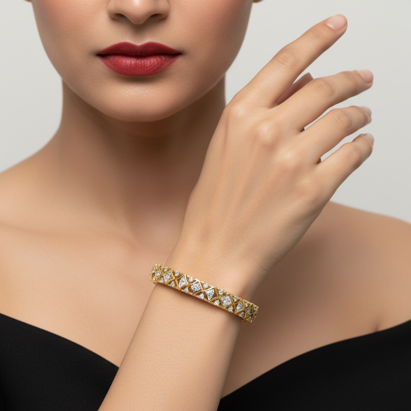 Generated image of an Indian female model wearing the yellow gold Art Deco hourglass lattice bangle with alternating pavé fan diamond triangles and round brilliant solitaire diamond waist accents