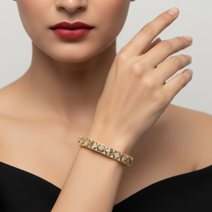 Generated image of an Indian female model wearing the yellow gold Art Deco hourglass lattice bangle with alternating pavé fan diamond triangles and round brilliant solitaire diamond waist accents