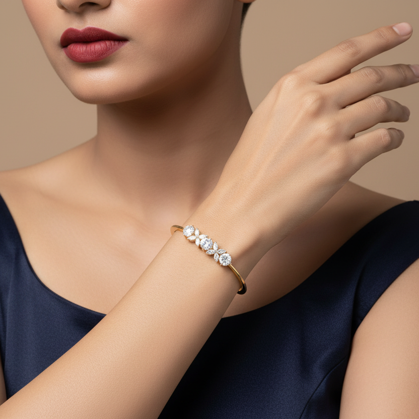 Generated image of an Indian female model wearing the yellow gold botanical flower cluster bangle with three large round brilliant diamonds flanked by marquise diamond petal clusters