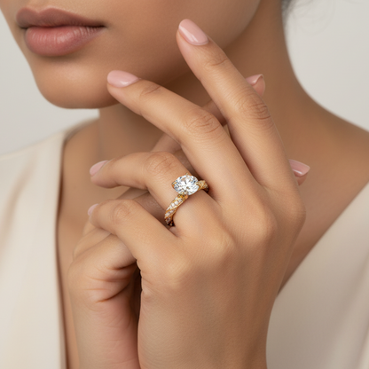 Generated image of an Indian female model wearing the yellow gold four-claw round brilliant diamond solitaire engagement ring with intricate twisted vine and pavé diamond eternity shank
