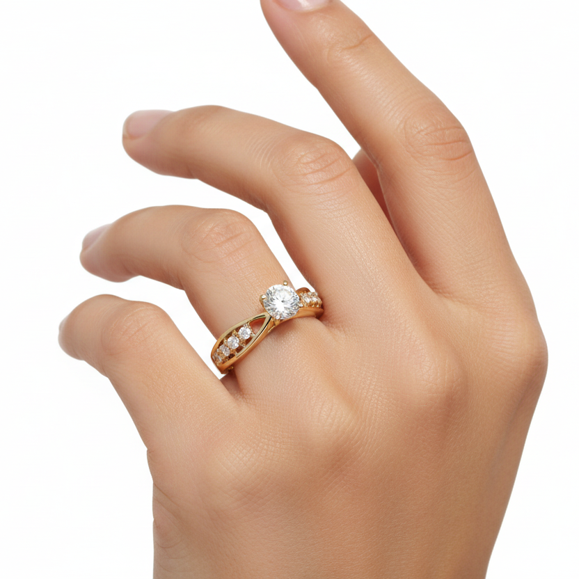 Generated image of an Indian female model wearing the yellow gold four-prong round brilliant solitaire engagement ring with twisted crossover split shank pavé diamond band