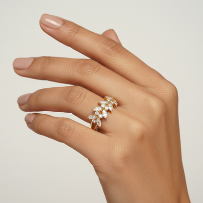 Generated image of an Indian female model wearing the yellow gold marquise and round brilliant diamond leaf vine ring