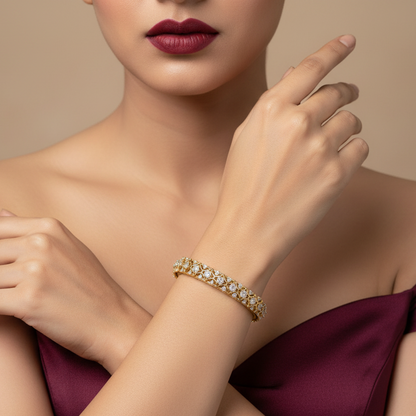 Generated image of an Indian female model wearing the yellow gold Mughal arch lattice bangle with floating round brilliant diamond stations and sparkling diamond junction clusters