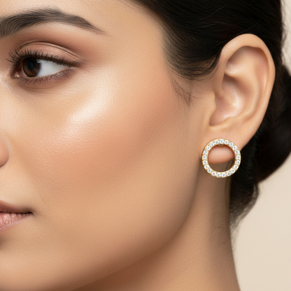 Generated image of an Indian female model wearing the yellow gold open circle pavé diamond hoop stud earrings