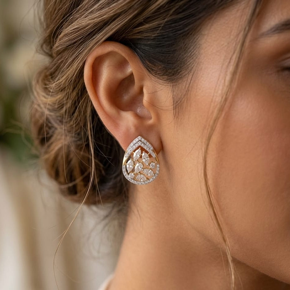 Close-up of a woman wearing a diamond earring with a blurred background