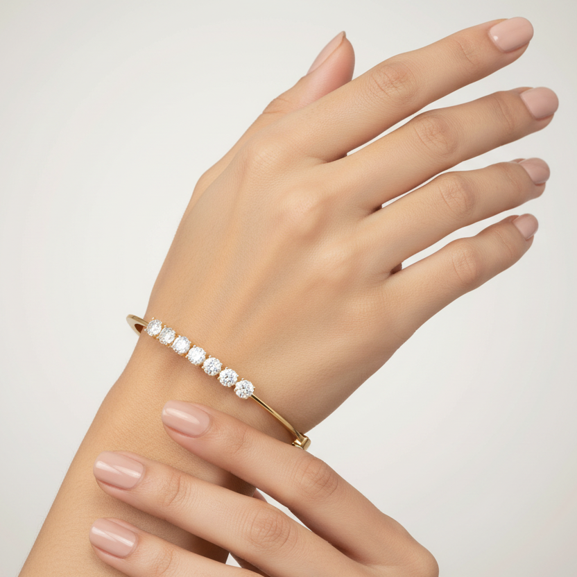 Generated image of an Indian female model wearing the yellow gold seven-stone round brilliant diamond bangle bracelet
