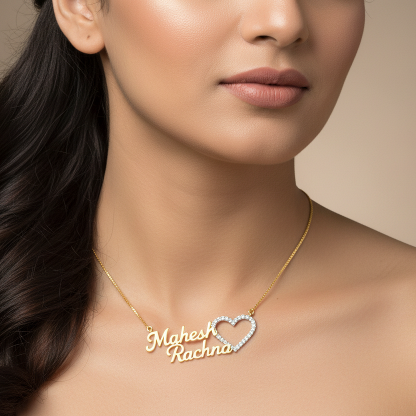 Generated image of an Indian female model wearing the yellow gold two-name personalised nameplate necklace with pavé diamond open heart charm