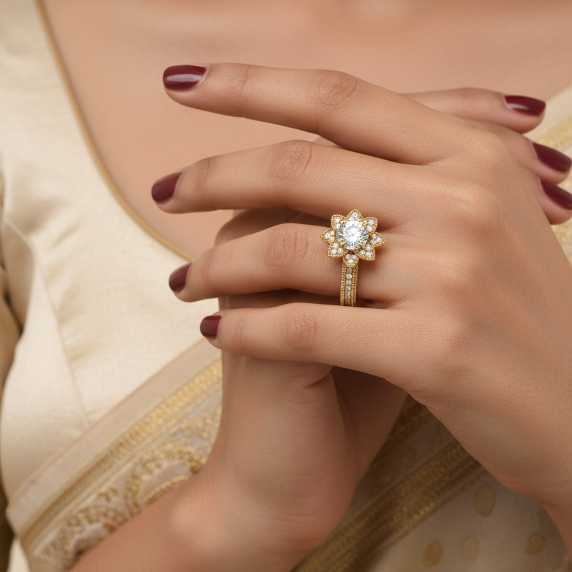 Generated image of an Indian female model wearing the yellow gold vintage Art Deco lotus flower halo engagement ring with milgrain-edged pointed petal halo and pavé diamond milgrain shank