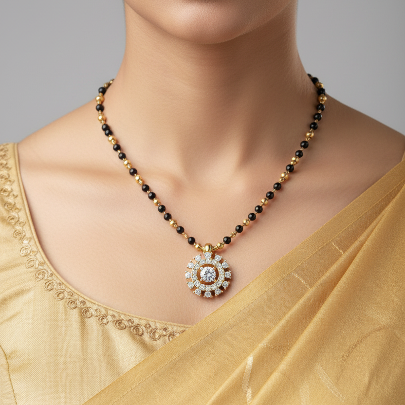 Indian female model wearing yellow gold sunburst diamond mangalsutra pendant on black bead chain
