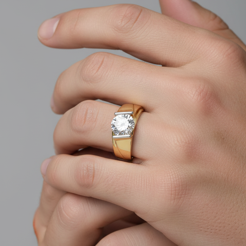 Male model wearing bold yellow gold solitaire diamond ring