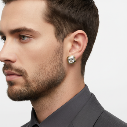 Male model wearing delicate two-tone gold emerald-cut diamond stud