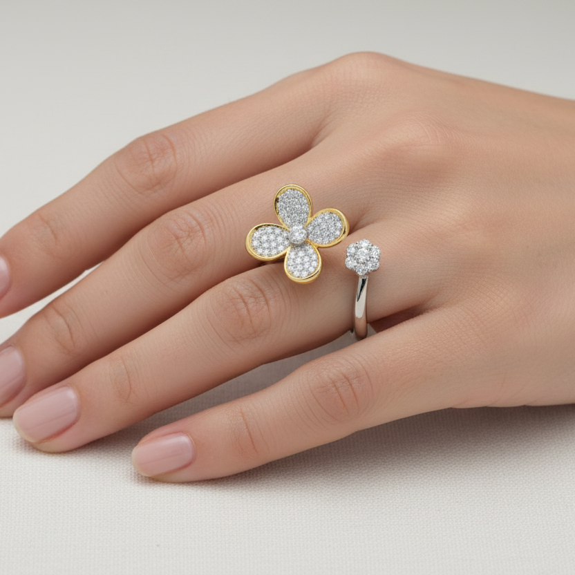 Two-tone gold pavé diamond flower bypass ring on model