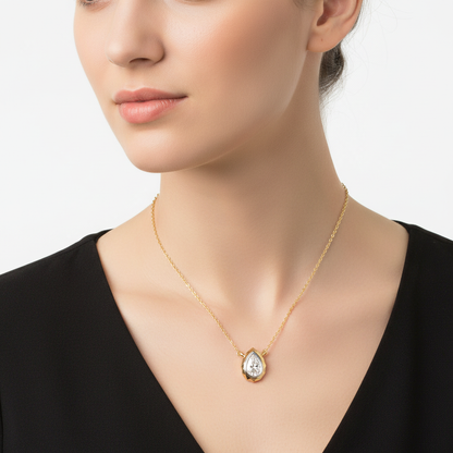 Two-tone pear diamond pendant necklace on model