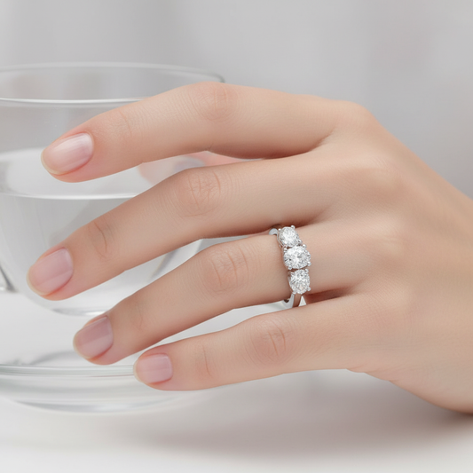 White gold five-stone cushion-cut diamond anniversary band on model