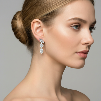 White gold mixed-cut diamond linear drop earrings on model