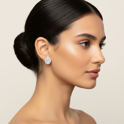 White gold pear-shaped diamond double halo stud earrings on model