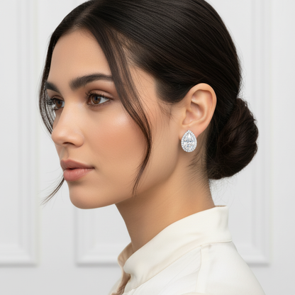 White gold pear-shaped diamond double halo stud earrings on model