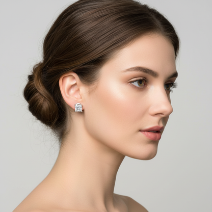 White gold princess-cut diamond stud earrings on model