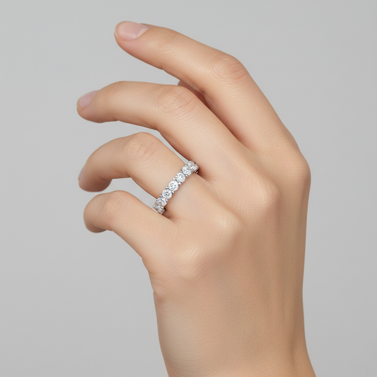 White gold round brilliant diamond eternity band on model