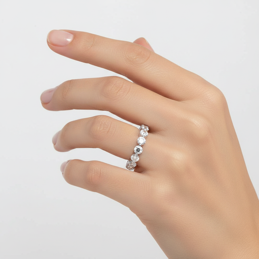 White gold round brilliant diamond eternity band on model