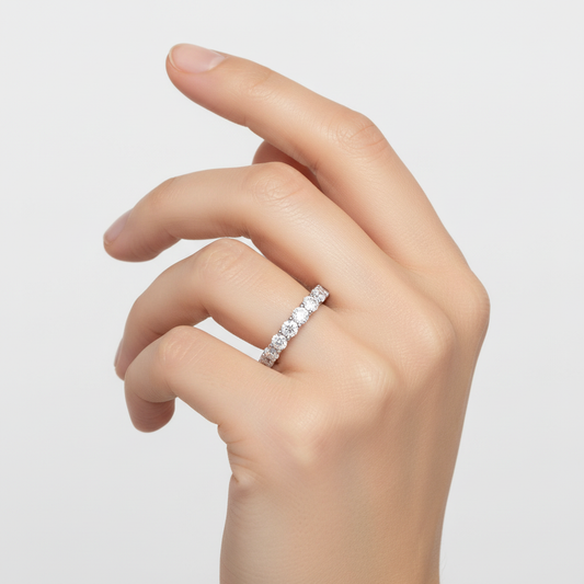 White gold round brilliant diamond eternity band on model