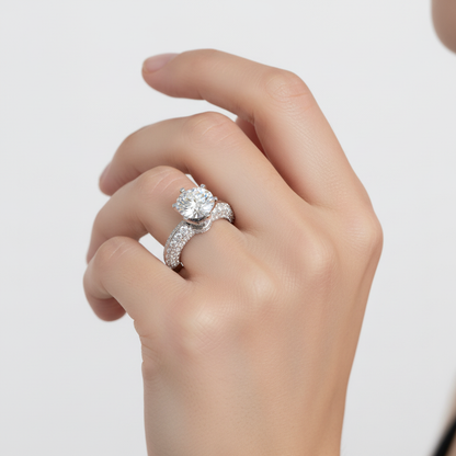 White gold round brilliant diamond solitaire engagement ring with triple-row pavé band on model