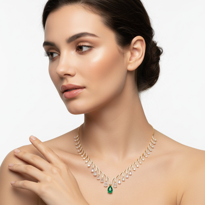 Yellow gold diamond and emerald fringe necklace on model
