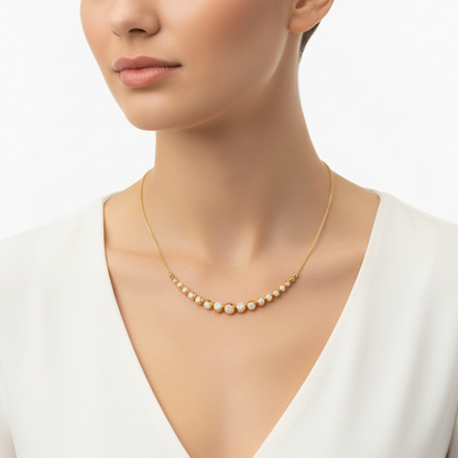 Yellow gold diamond bead necklace on model