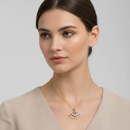 Yellow gold evil eye diamond pendant with blue enamel on model
