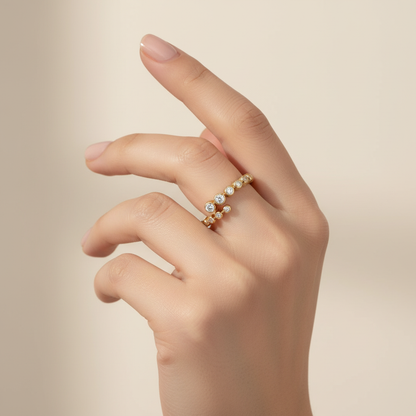 Yellow gold graduated diamond stackable ring on model