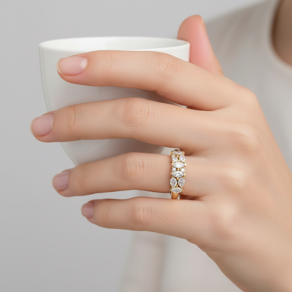 Yellow gold mixed-cut diamond anniversary band with marquise and round brilliant diamonds on model