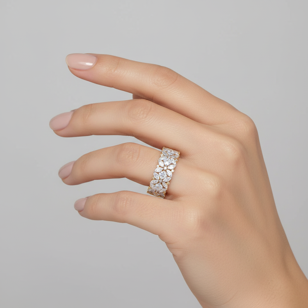 Yellow gold mixed-cut diamond floral cluster eternity band on model
