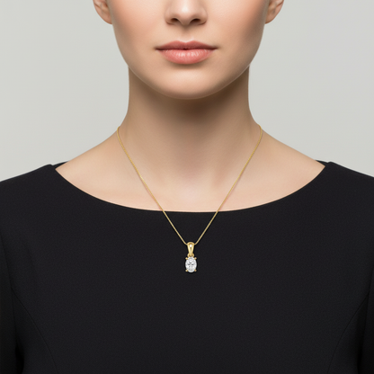 Yellow gold oval diamond solitaire pendant on model