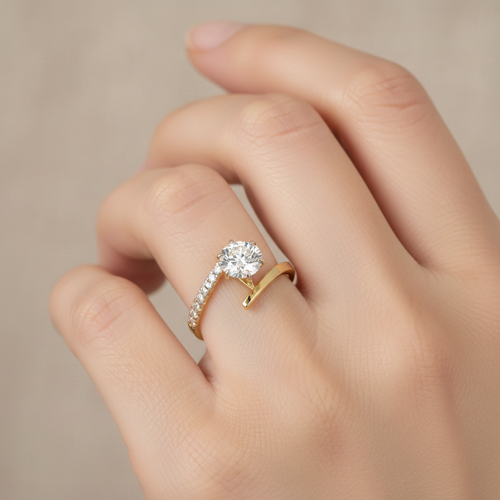 Yellow gold round brilliant diamond bypass engagement ring with pavé band on model