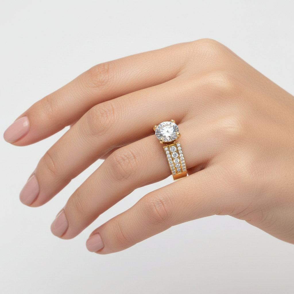 Yellow gold round brilliant diamond engagement ring with triple-row pavé band and decorative gallery cutouts on model