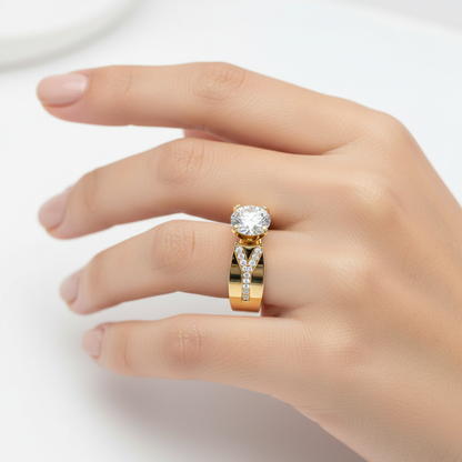 Yellow gold round brilliant diamond engagement ring with wide channel-set pavé band on model