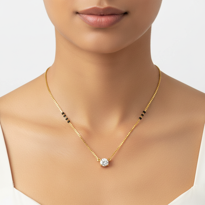 Yellow gold round diamond solitaire pendant necklace on model